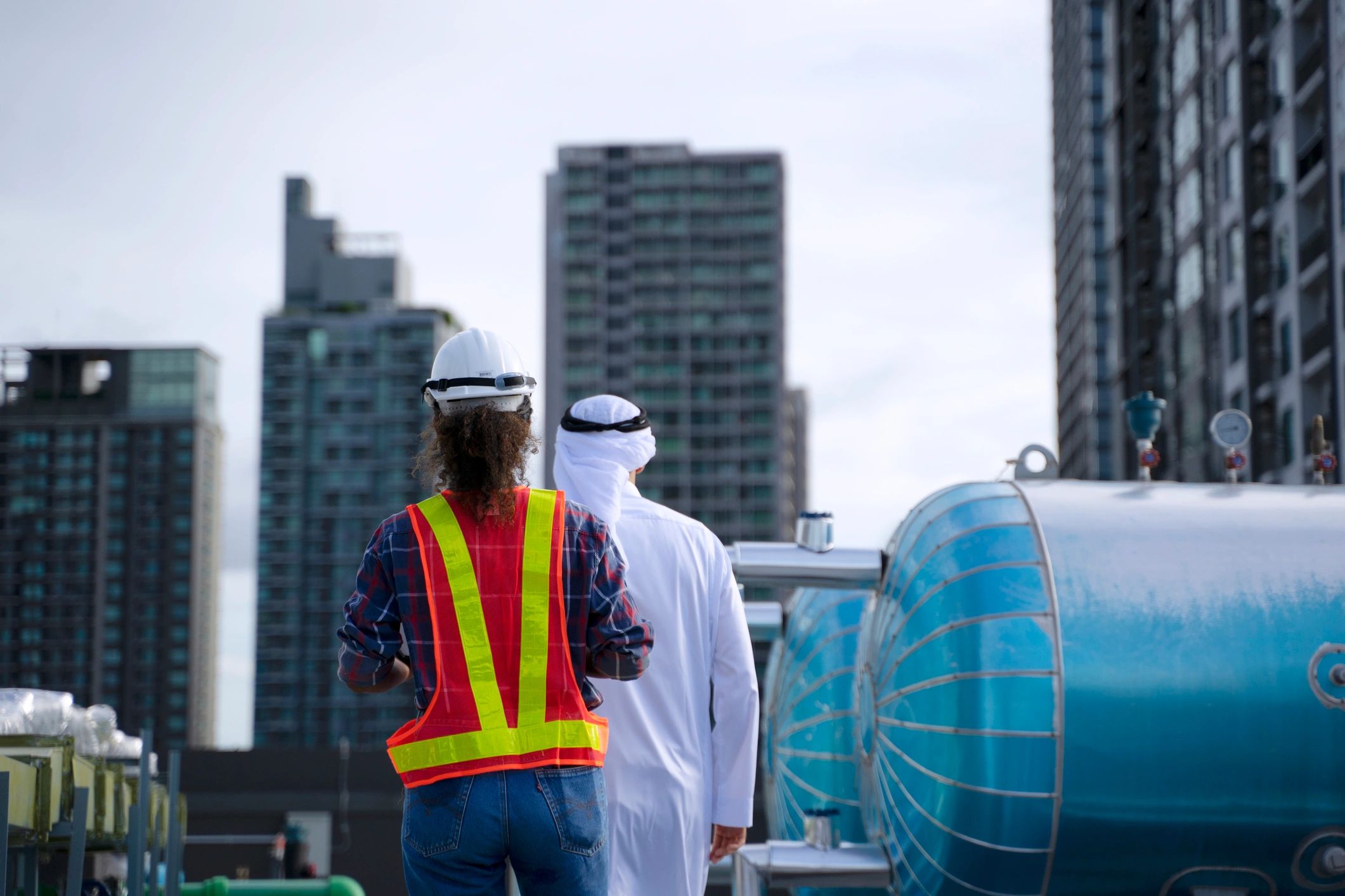Business representative and engineer at a worksite